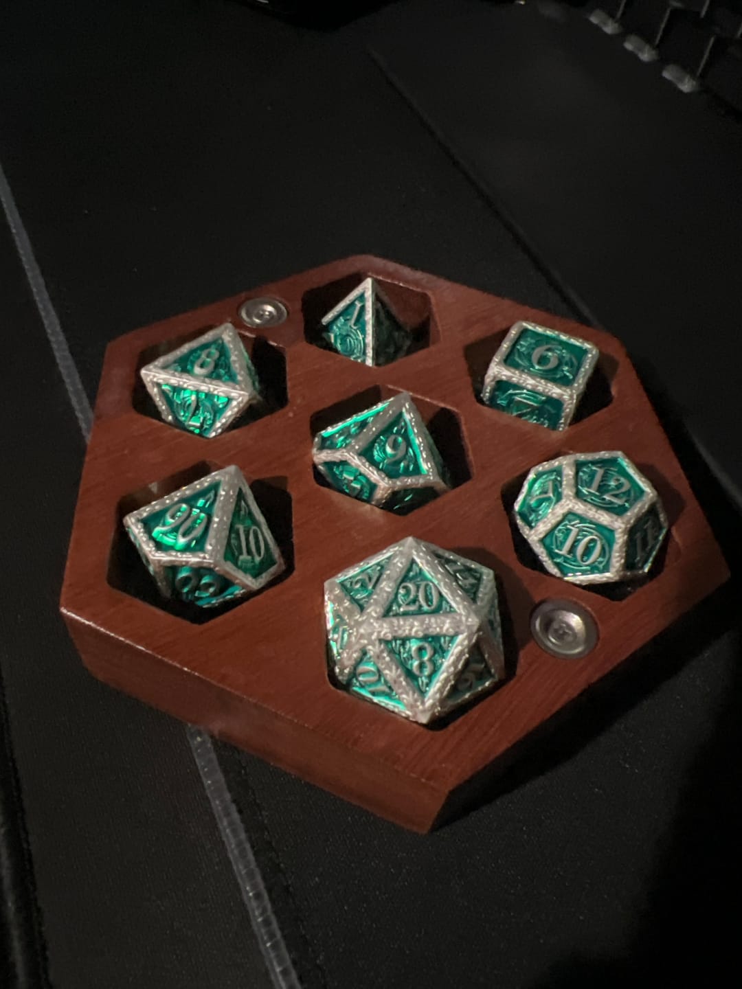 Customer photo review of Ballad of the Bard Green and Silver Metal Dice Set