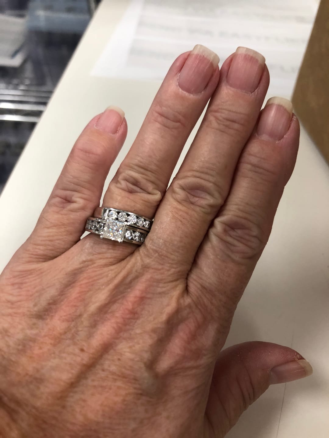 Customer photo review of Princess Cut Moissanite With Round Channel Set Engagement Ring