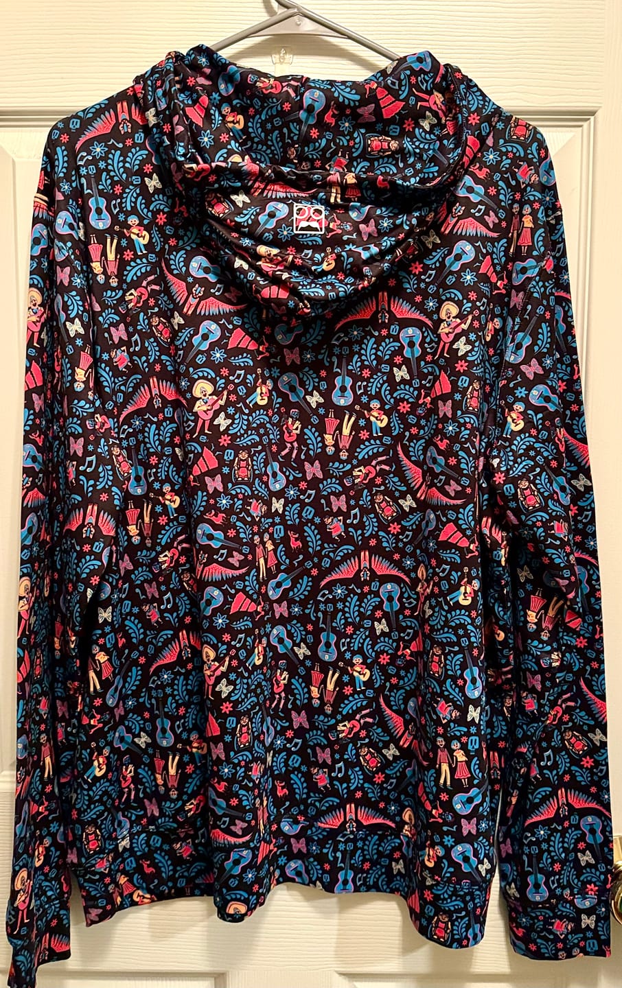 Customer photo review of Disney and Pixar Coco "Music In Me" – Performance Hoodie