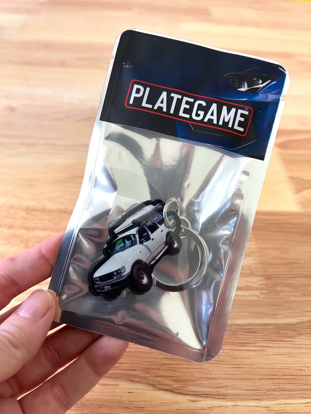 Customer photo review of PG Mini Custom Keychain