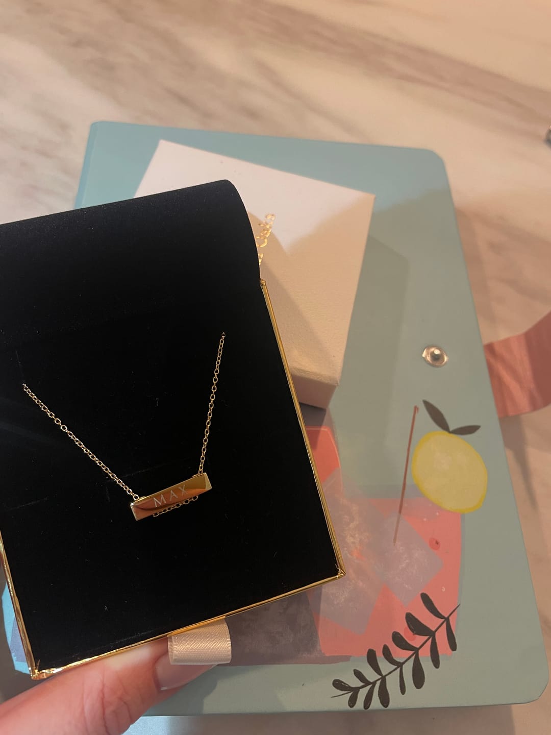 Customer photo review of 2cm Letter Bar Necklace Gold Horizontal