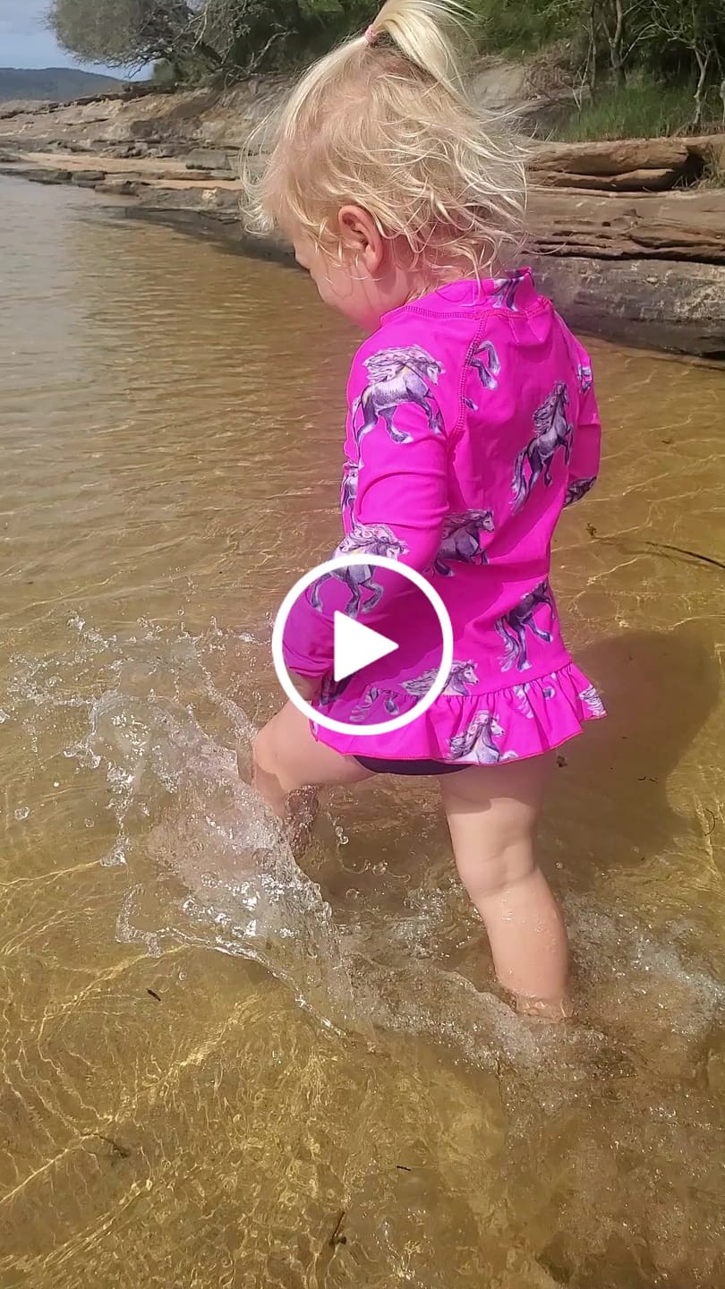 Customer video review of Fluro Horses Frill Rash Top
