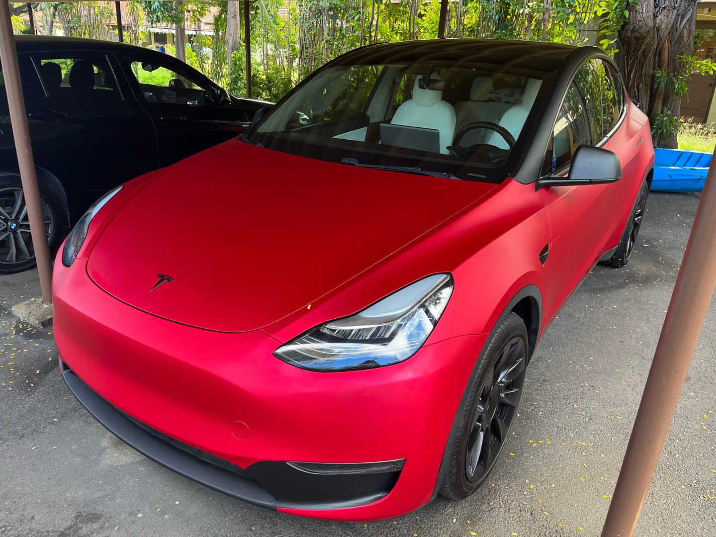 Customer photo review of Satin Chrome Prismatic Red Vinyl Wrap