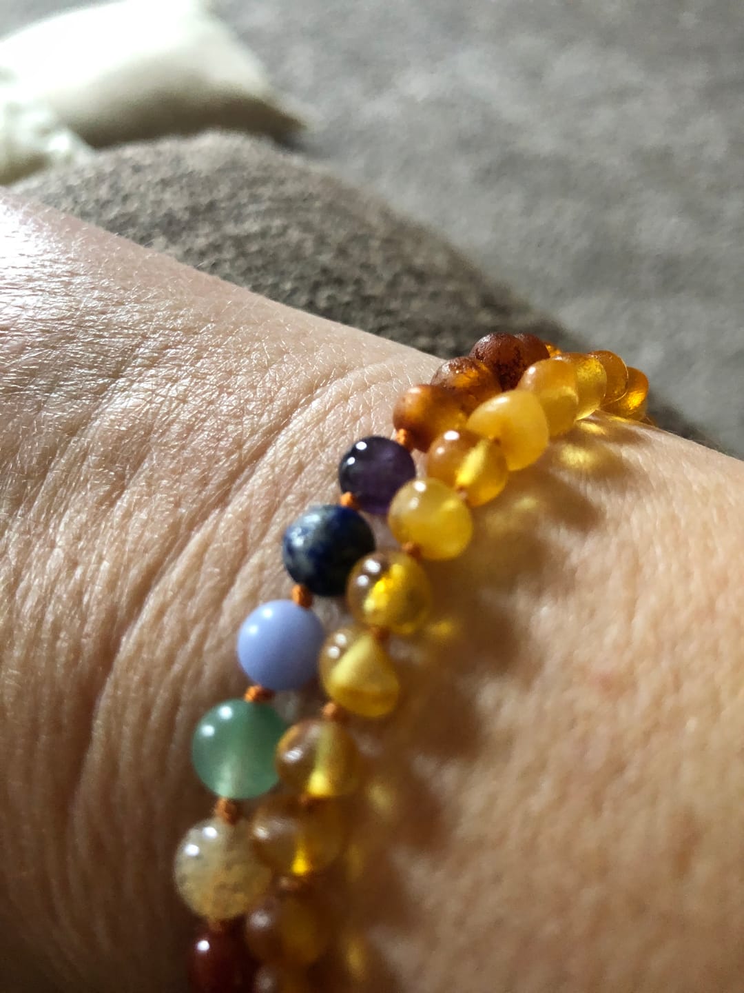 Customer photo review of Raw Cognac Baltic Amber + CHAKRA Crystals || Anklet or Bracelet