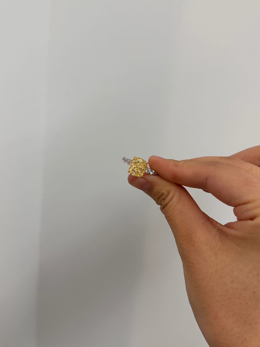 Customer photo review of Louily Stunning Two-tone Cushion Cut Yellow Sapphire Engagement Ring