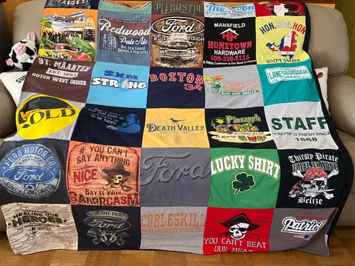 T-shirt quilt with automotive, travel themes by Deborah from MA