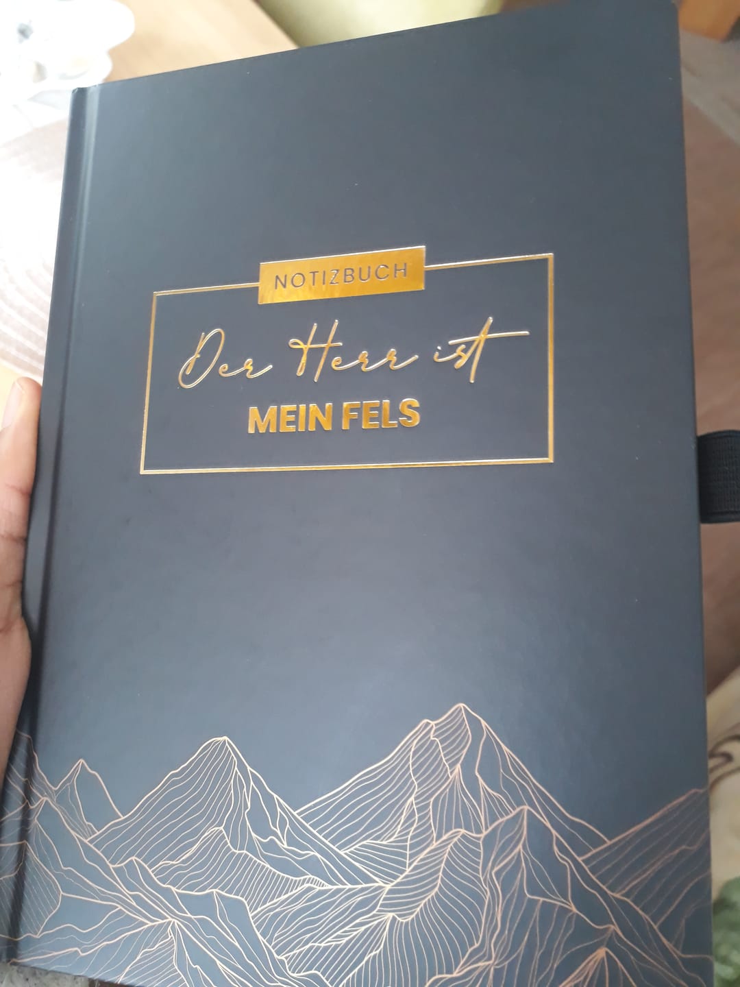 Customer photo review of Notizbuch "Der Herr ist mein Fels" · A5 · Hardcover mit Goldglanz Prägung