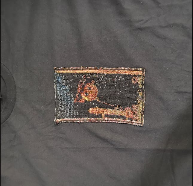 Customer photo review of Coraline Tapestry Tee