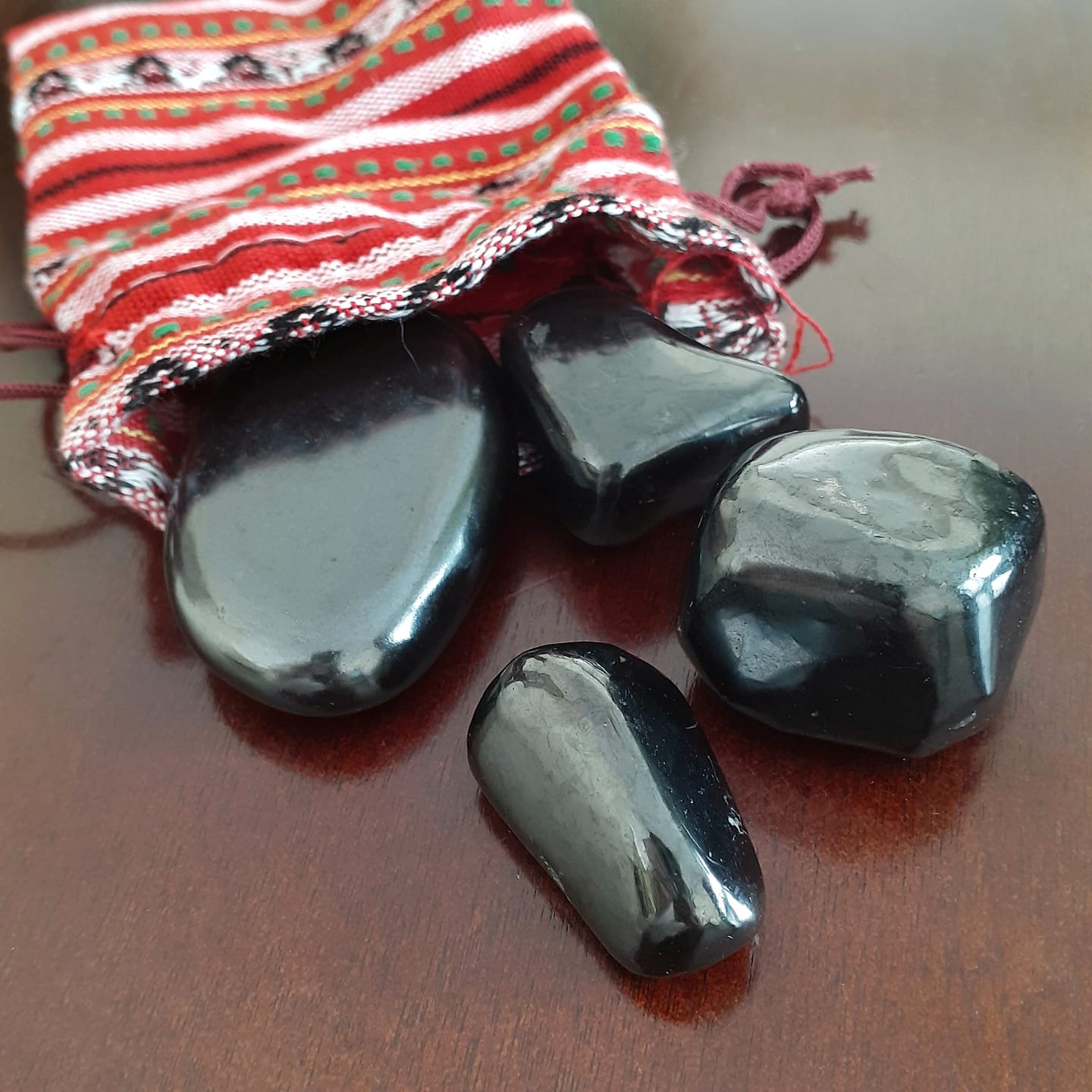 Customer photo review of Bag O' Rocks, 4 Ounces Tumbled Black Shungite Stones in Little Bag
