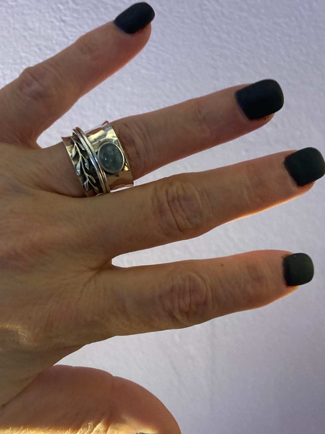 Customer photo review of Aquamarine Leaf Spinner ring Sterling Silver