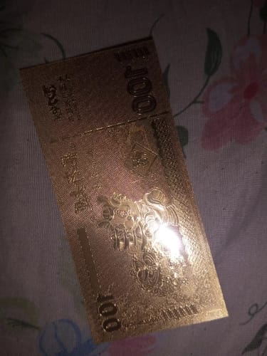 Customer photo review of GOLD LUCKY DRAGON FOIL - GOOD LUCK CHARMS FOR MONEY