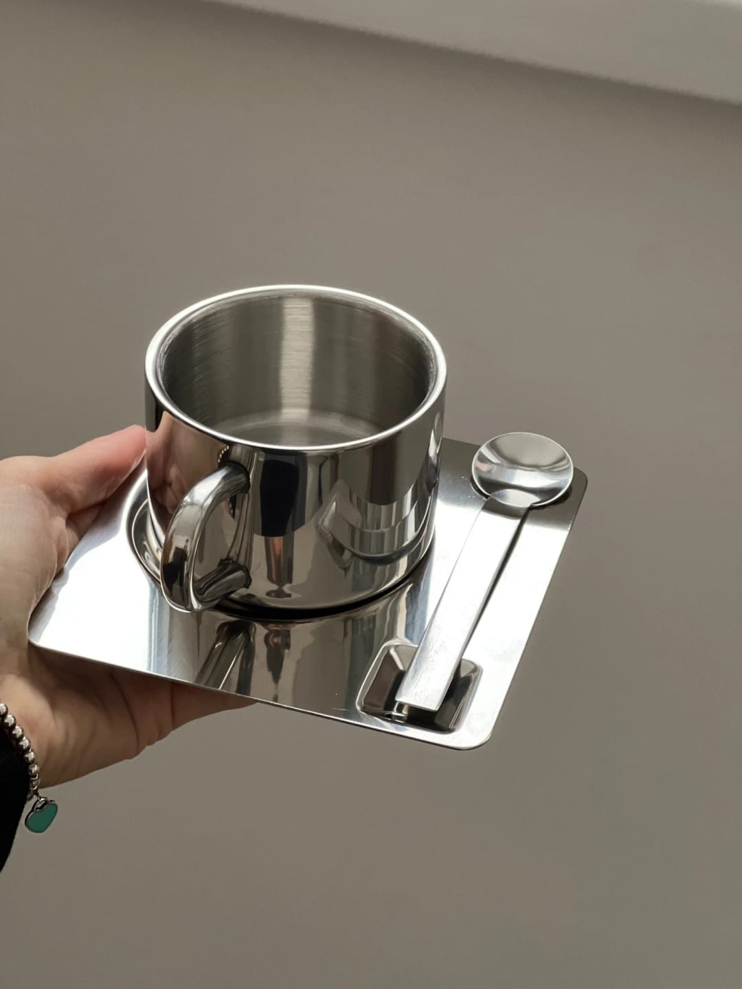 Customer photo review of Steel Coffee Cup with Square Saucer & Spoon