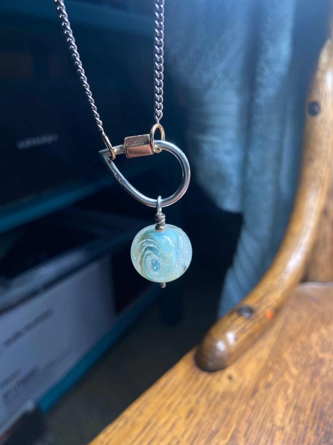 Customer photo review of Cosmic Swirl Memorial Pendant