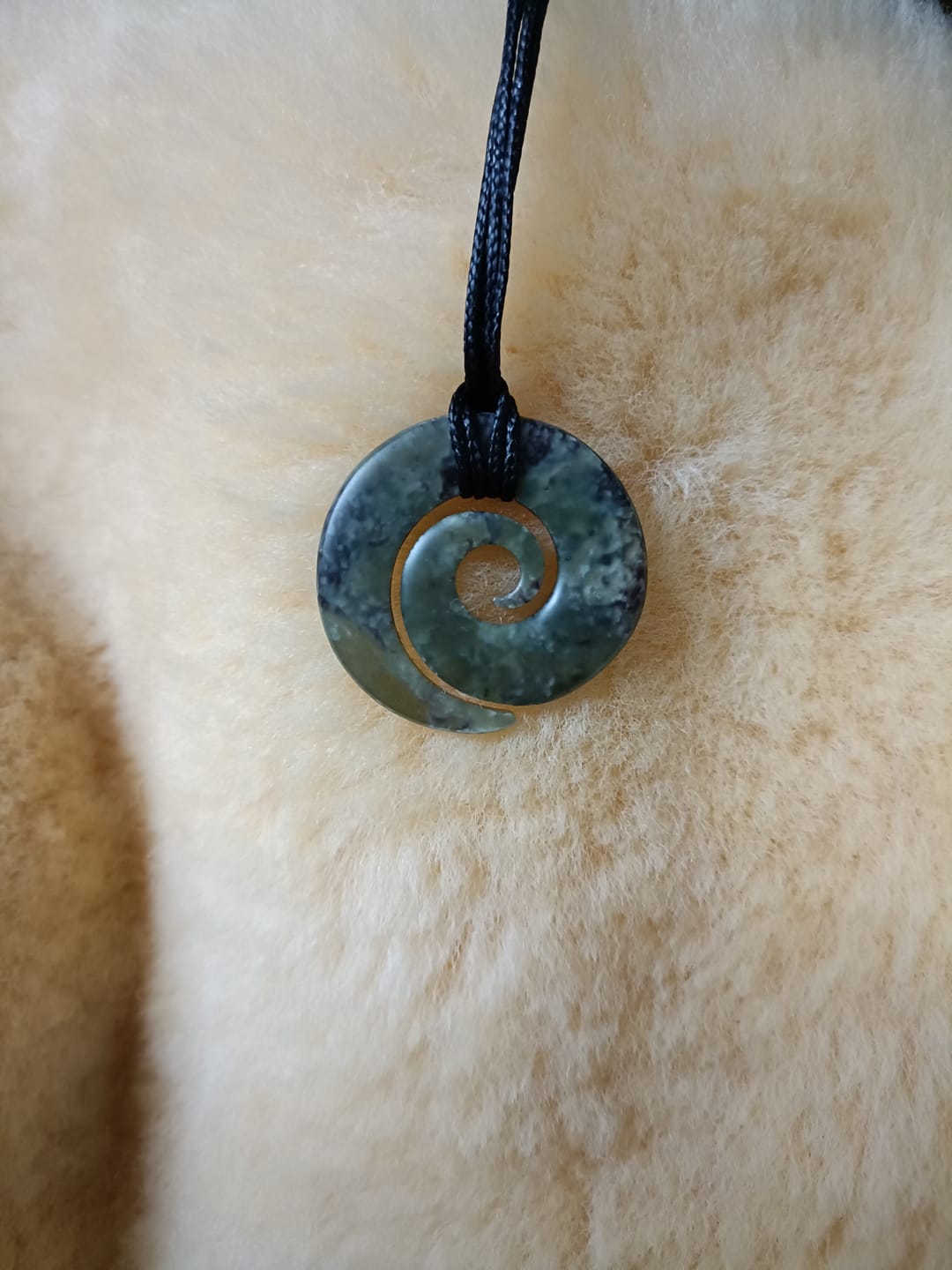 Customer photo review of Genuine NZ Greenstone Open Koru Necklace
