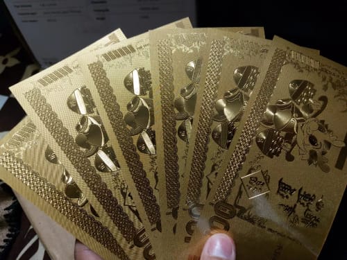 Customer photo review of GOLD LUCKY DRAGON FOIL - GOOD LUCK CHARMS FOR MONEY