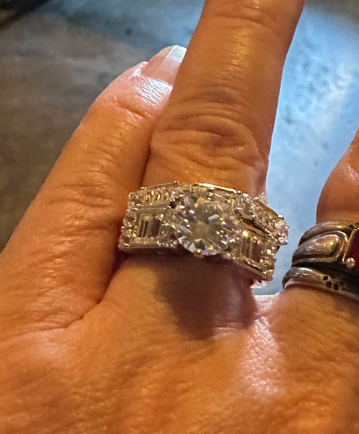 Customer photo review of Round Moissanite Emerald-Cut Side Stone Engagement Ring