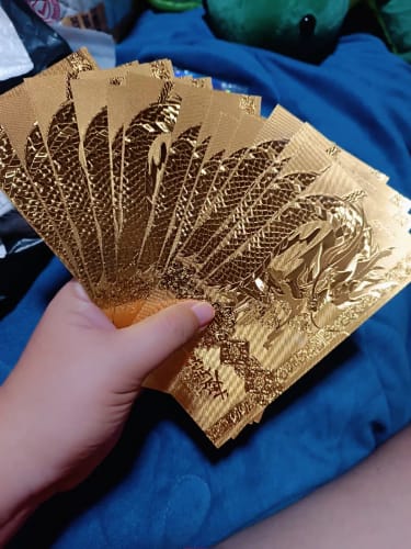 Customer photo review of GOLD LUCKY DRAGON FOIL - GOOD LUCK CHARMS FOR MONEY