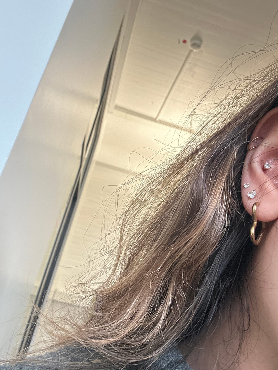 Customer photo review of Bright Heart Ohrstecker | 18K vergoldet
