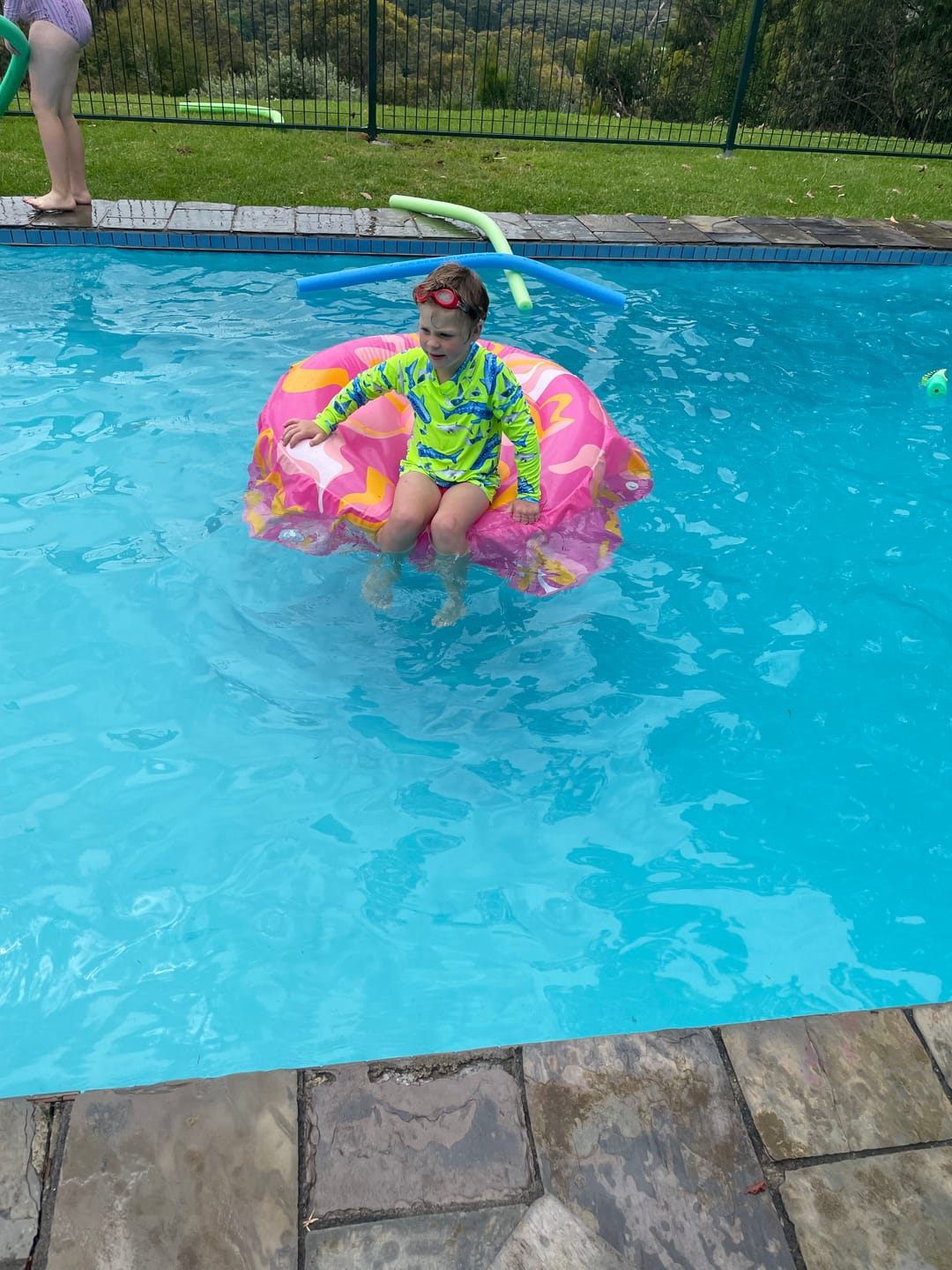 Customer photo review of Fluro Green Sharks Kids' Rash Top