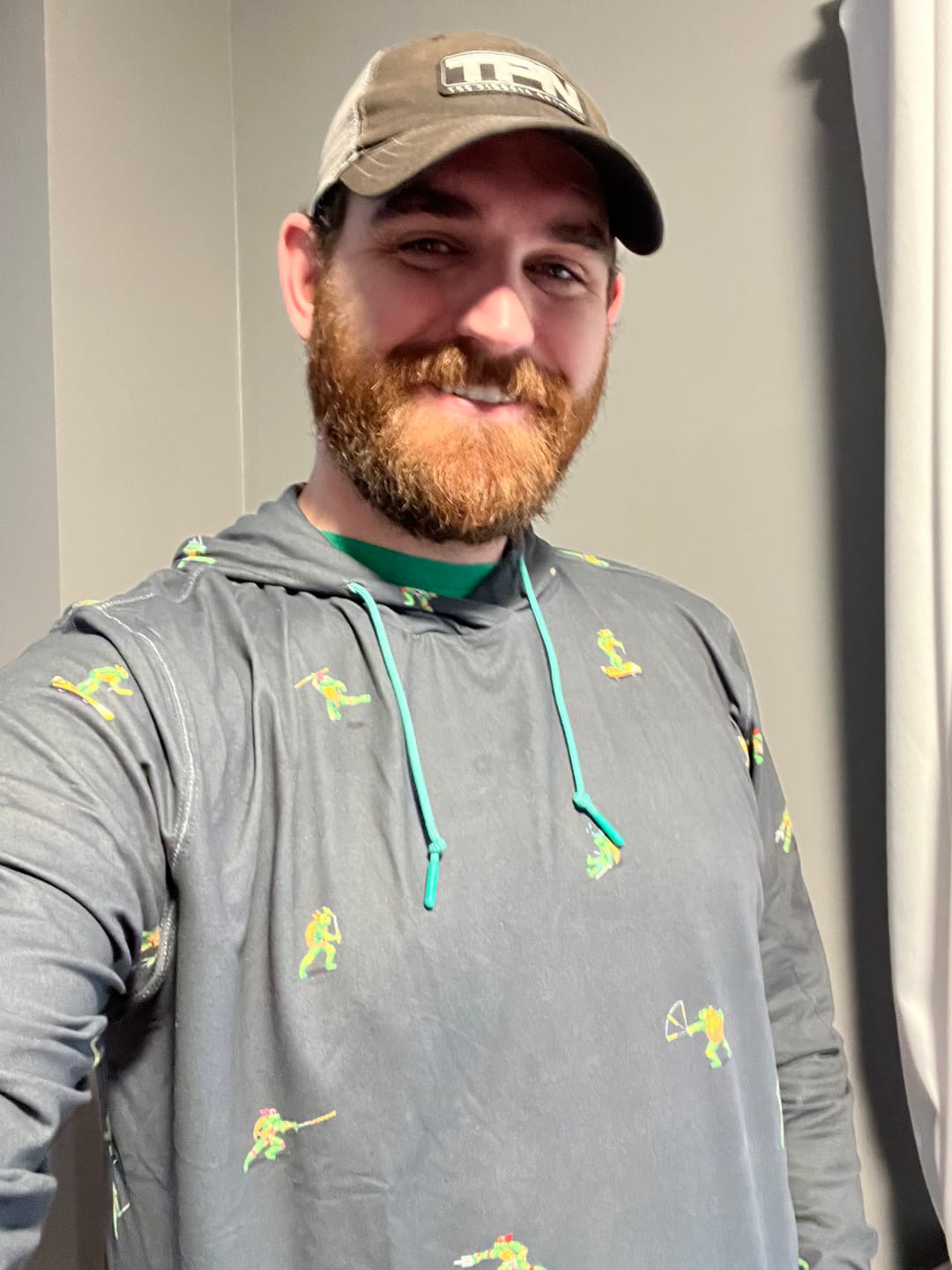 Customer photo review of Teenage Mutant Ninja Turtles "Choose Your Turtle (At Night)" – Performance Hoodie