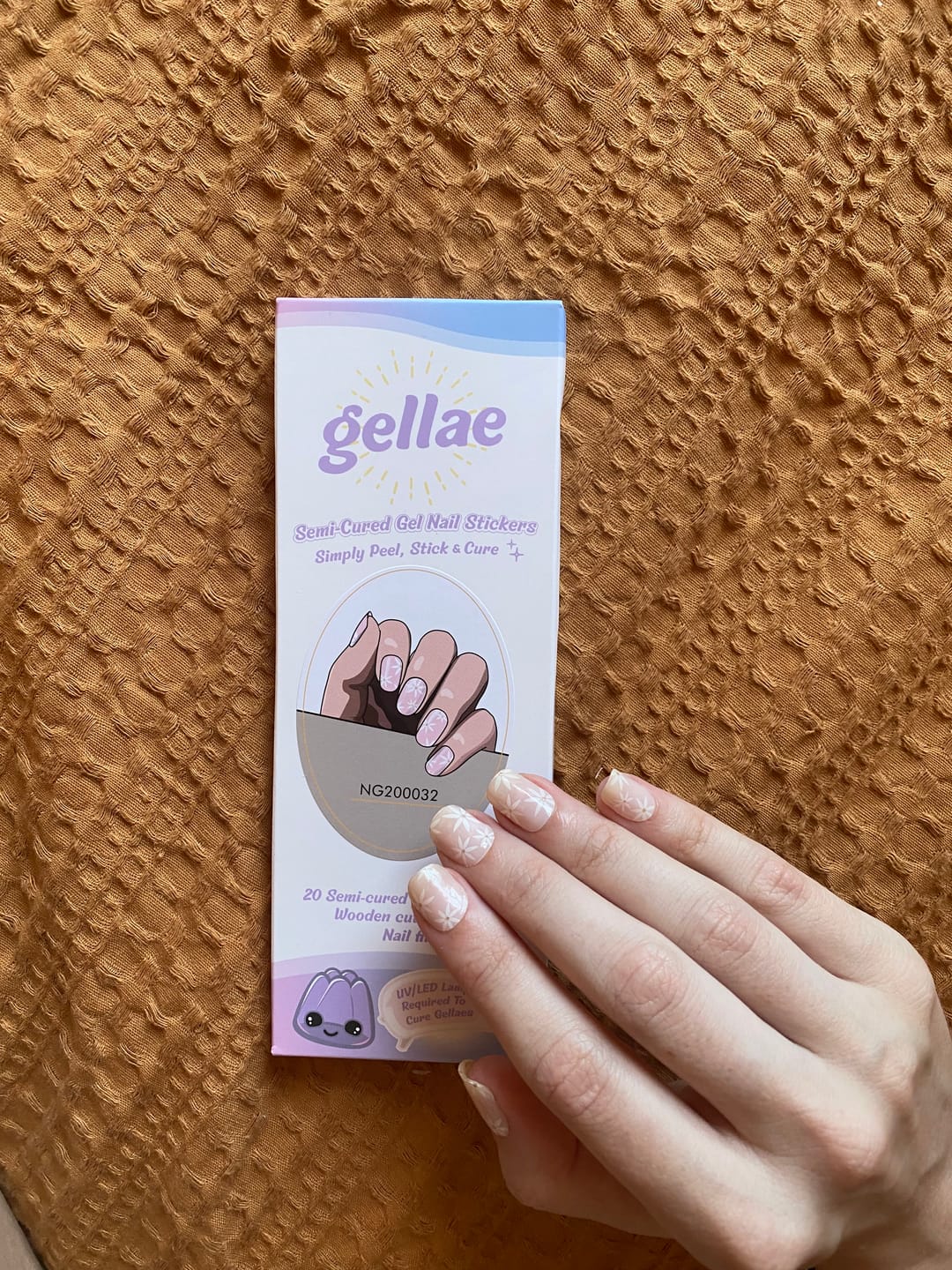 Customer photo review of Pretty Pink Daisies DIY Semicured Gel Nail Sticker Kit