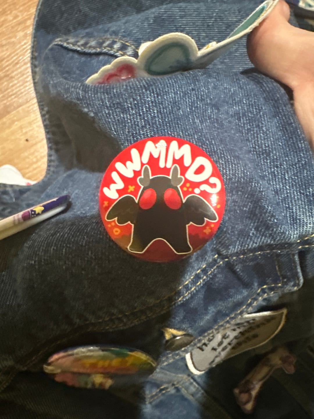 Customer photo review of What Would Mothman Do Button