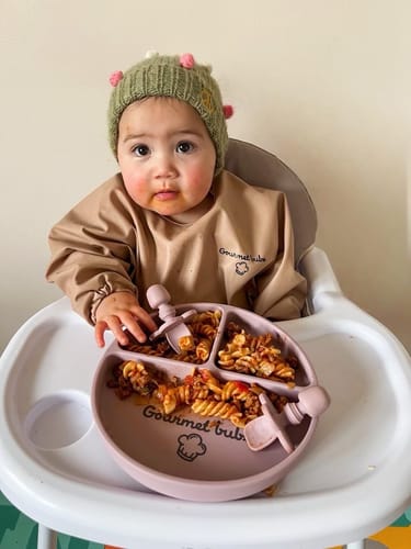 Customer photo review of Gourmet Bubs Waterproof  Feeding Smock with Bib Pouch - Peach