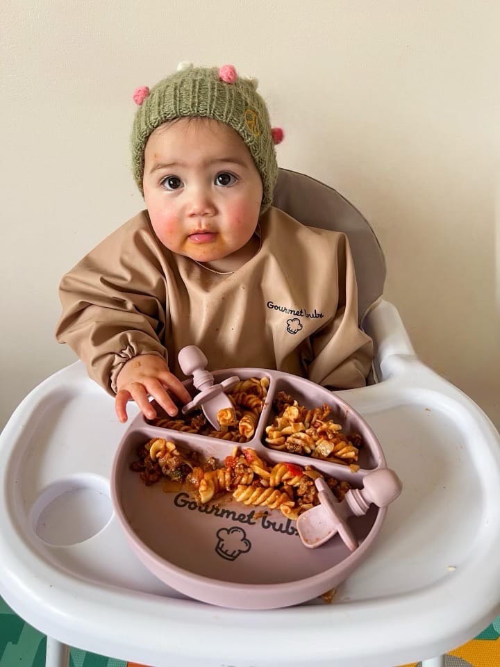 Customer photo review of Gourmet Bubs Waterproof  Feeding Smock with Bib Pouch - Peach