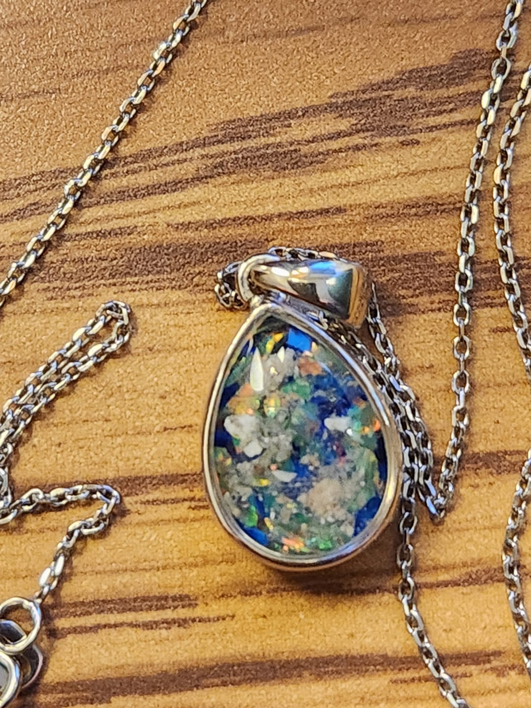 Customer photo review of Petite Pear Drop with Cremation Ashes