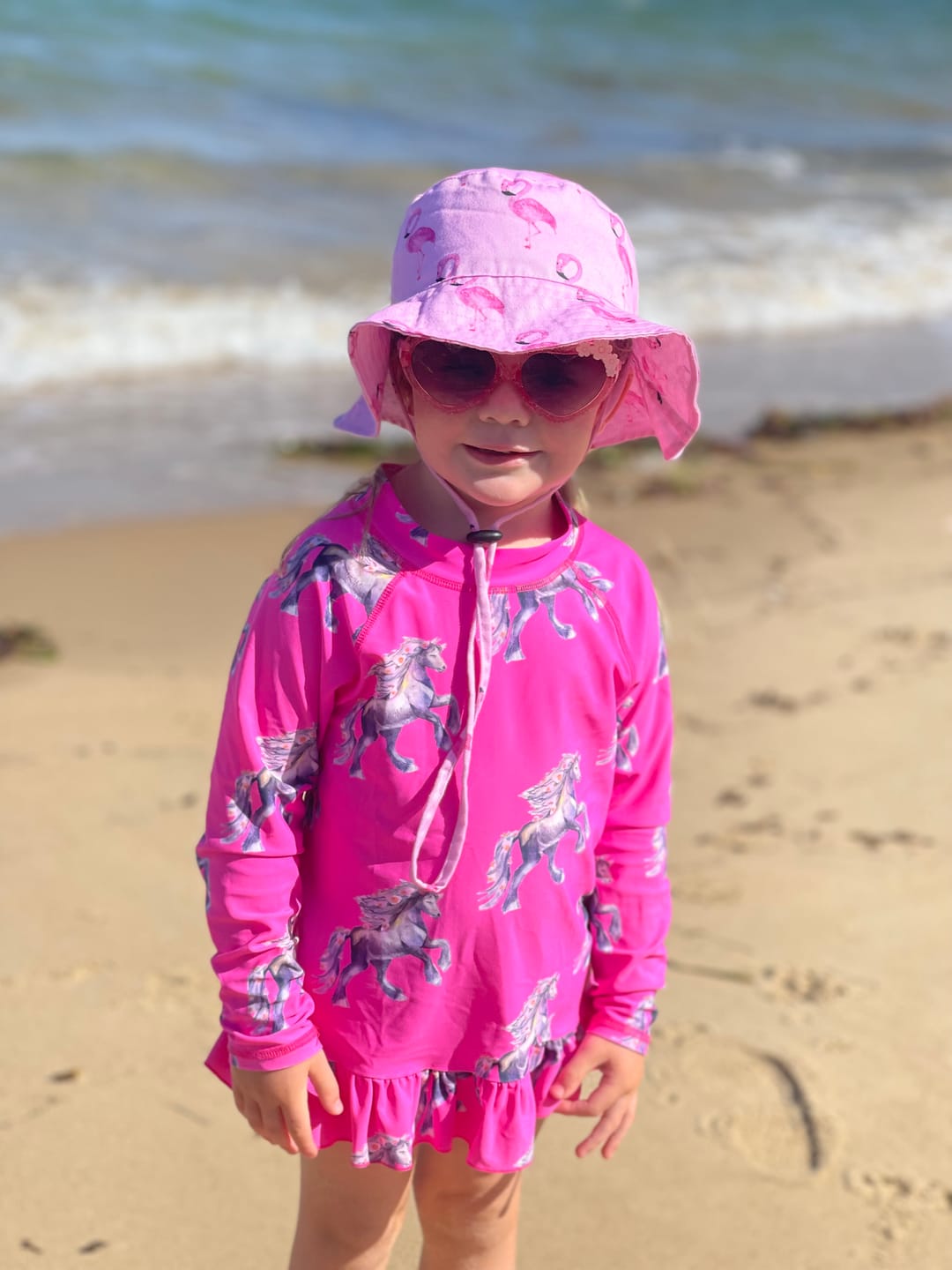 Customer photo review of Fluro Horses Frill Rash Top