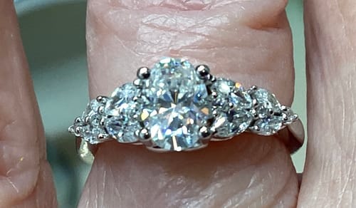 Customer photo review of Oval Cut Moissanite With Marquise Cluster Engagement Ring