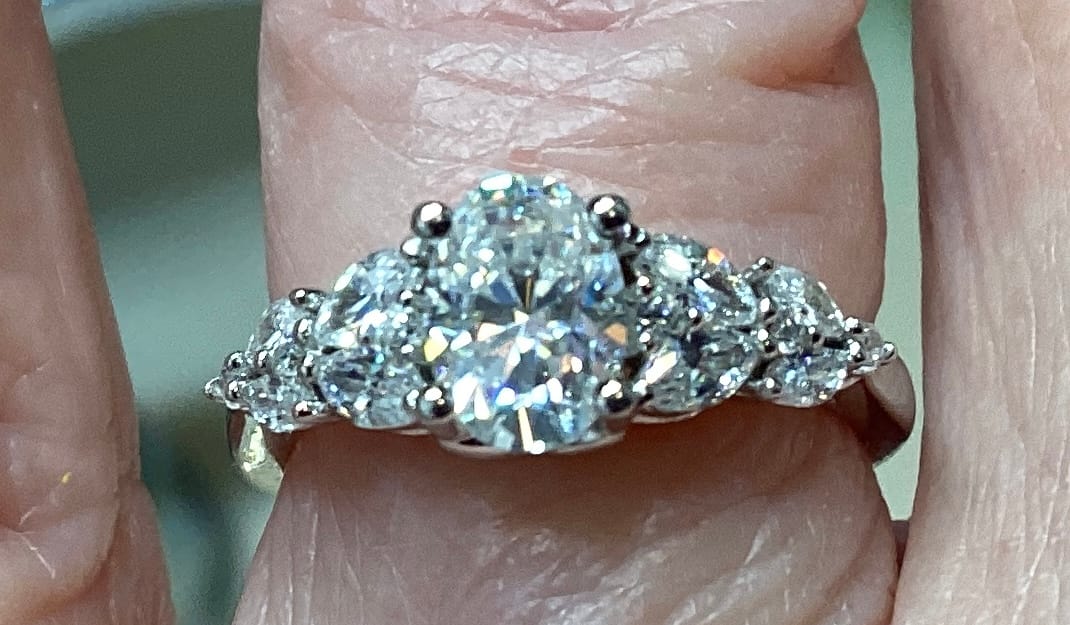 Customer photo review of Oval Cut Moissanite With Marquise Cluster Engagement Ring