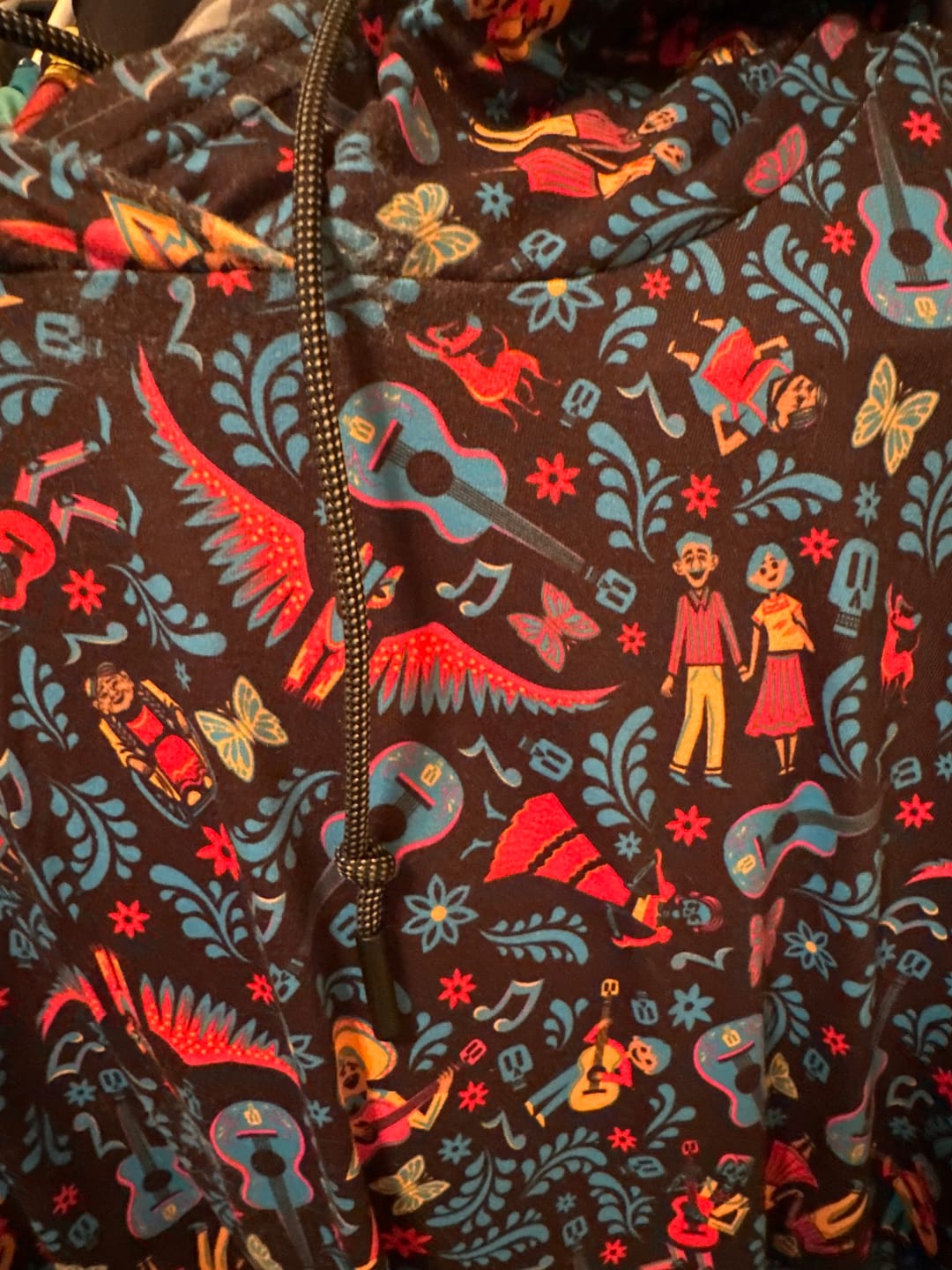 Customer photo review of Disney and Pixar Coco "Music In Me" – Performance Hoodie