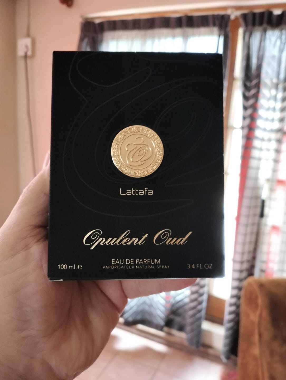 Customer photo review of Opulent Oud By Lattafa