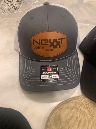 Customer photo review of Custom Leather Patch Trucker Hat - Richardson 112