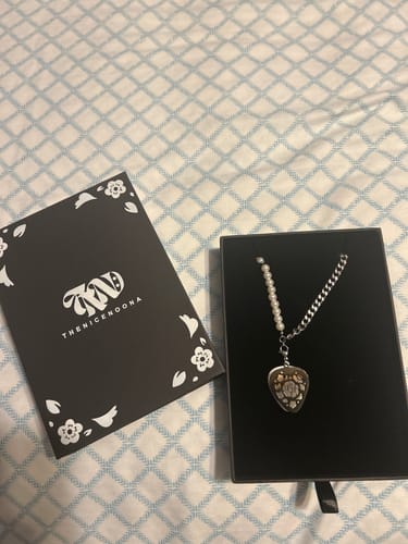 Customer photo review of BTS Suga Amygdala Jewelry