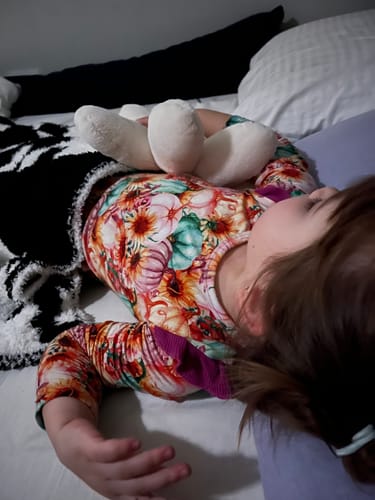 Customer photo review of Black & White Cow Print Toddler Blanket