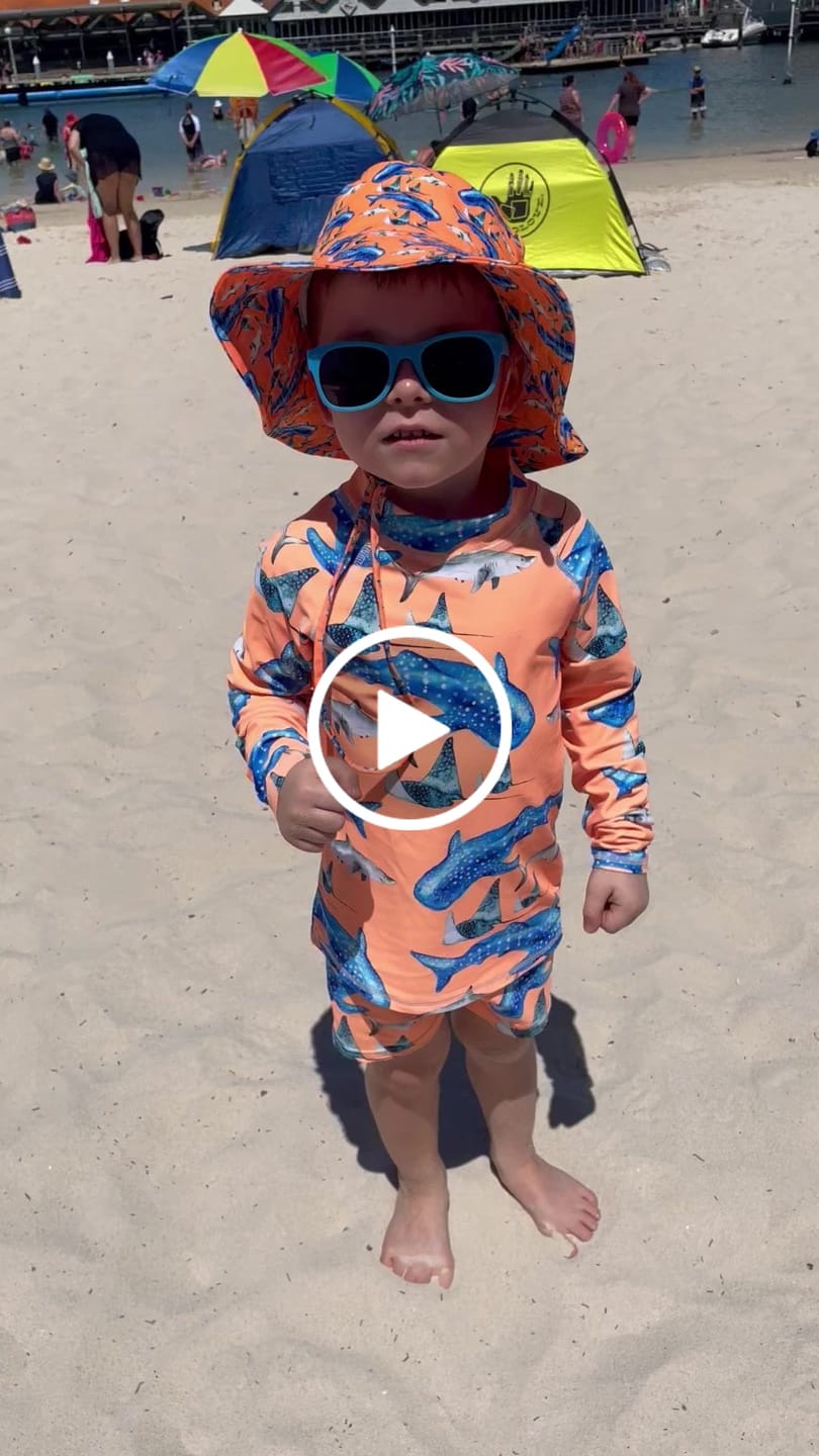 Customer video review of Fluro Orange Sharks Kids' Rash Top