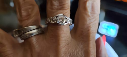 Customer photo review of Bezel Set Round Moissanite Scroll Accents Engagement Ring