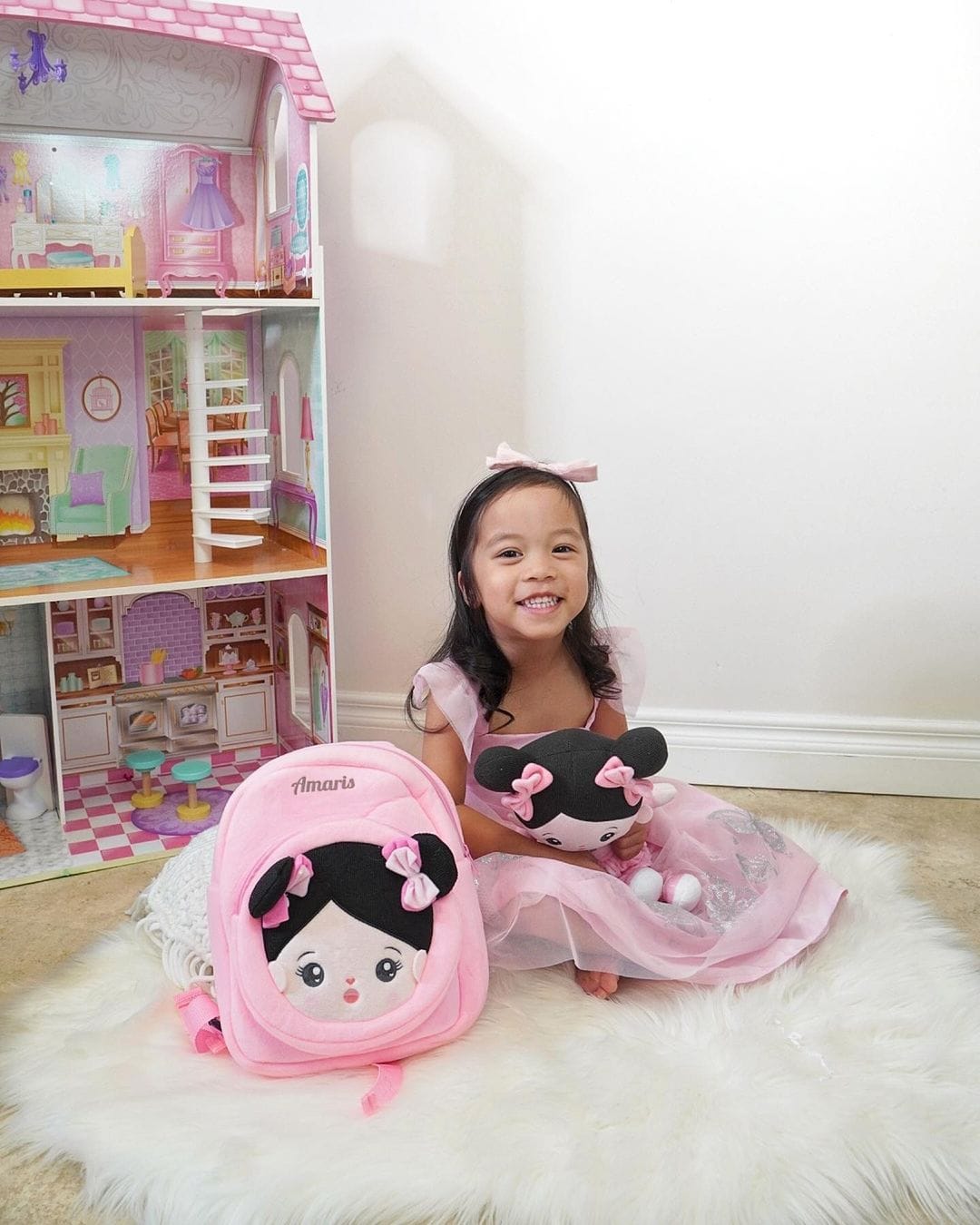 Customer photo review of Personalized Pink Black Hair Baby Doll
