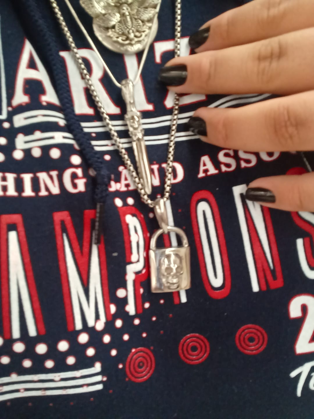 Customer photo review of CATACOMB SWORD PENDANT