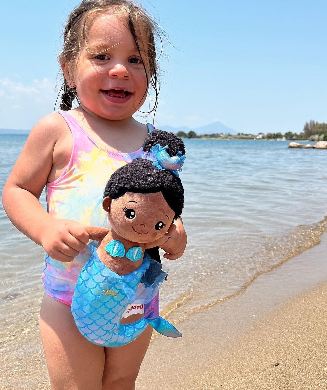 Customer photo review of Personalized Deep Skin Tone Fantasy Mermaid Plush Baby Girl Doll