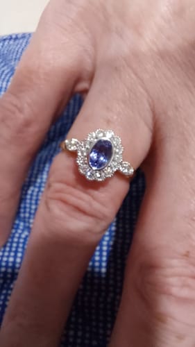 Customer photo review of Bluebird™ Tanzanite & 0.25ct TW Diamond Halo Ring in 9ct Yellow and White Gold