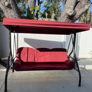 Customer photo review of 3-Seat Outdoor Porch Swing with Cupholders, Adjustable Canopy and Backrest, Wine Red