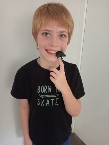 Customer photo review of Shark Tooth Sensory Chew Necklace - Free Hygiene Case