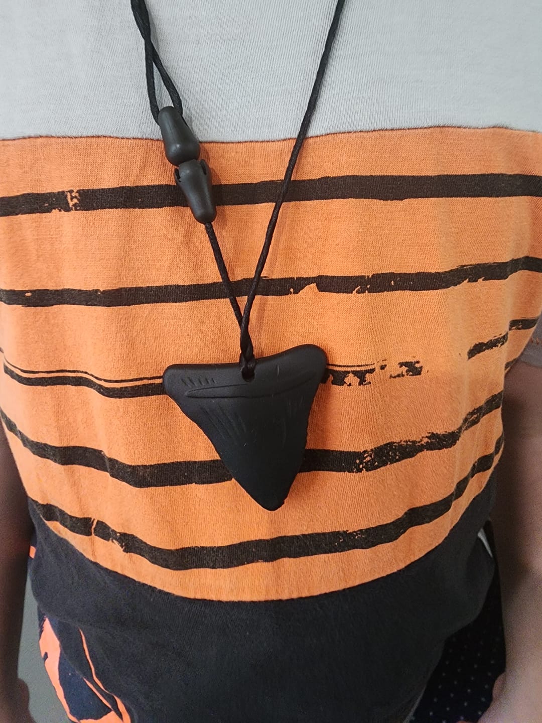 Customer photo review of Shark Tooth Sensory Chew Necklace - Free Hygiene Case