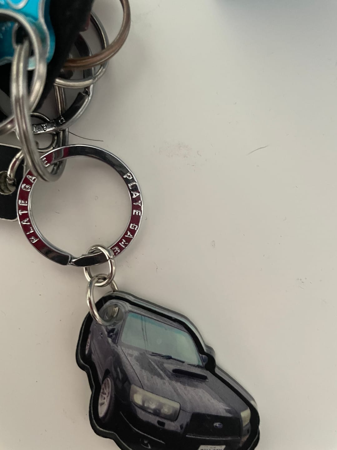 Customer photo review of PG Mini Custom Keychain
