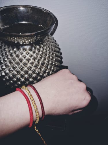 Kundenbewertung mit Foto zu Handgemachtes Tibetisches Buddhisten Glücks-Armband