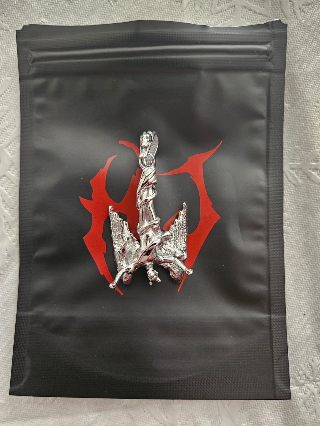 Customer photo review of FALLEN ANGEL PENDANT
