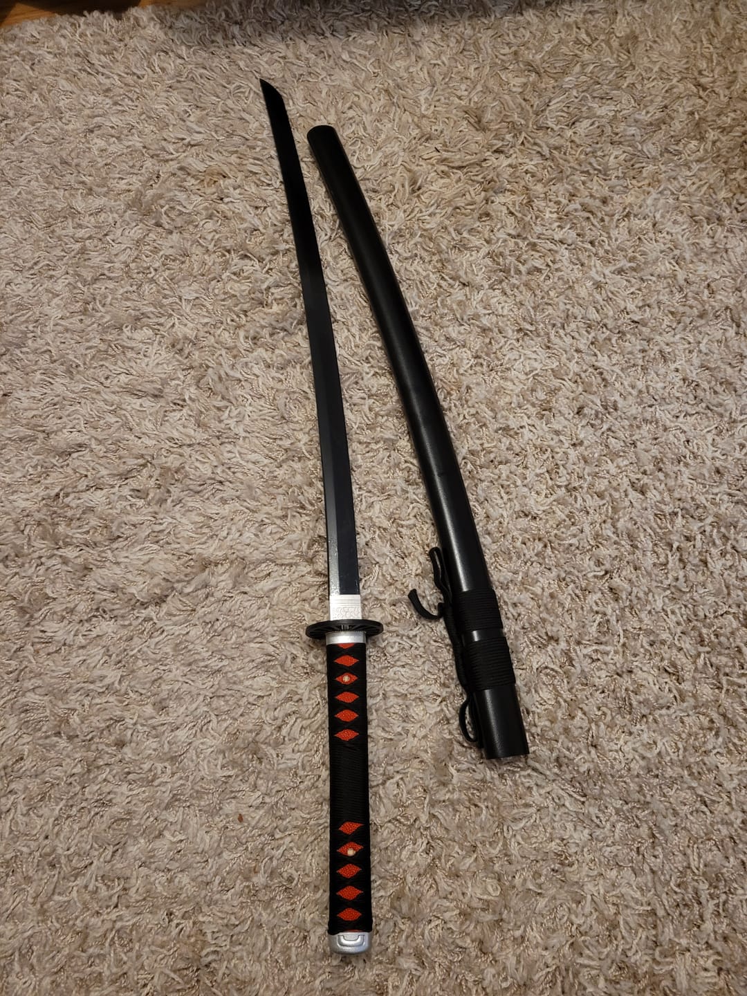 Customer photo review of The Tanjiro Handmade Katana T10 Steel Clay Tempered From Demon Slayer